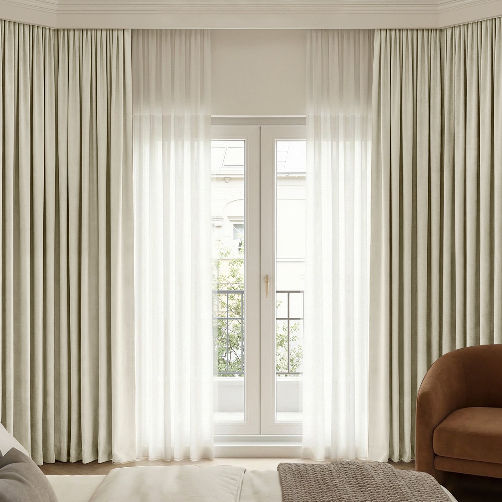 Plush beige Chenille blackout curtains layered with sheer white drapes.
