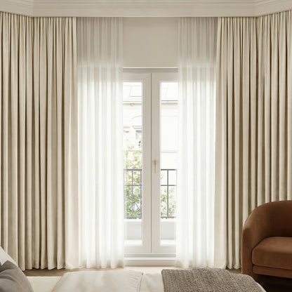 Bennett Chenille Blackout Curtain in light beige with plush texture, layered with sheer curtains.
