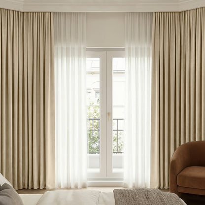 Bennett Chenille blackout curtains, custom beige with sheer white window treatments.