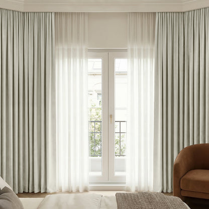 Bennett Chenille blackout curtains layered with sheer curtains
