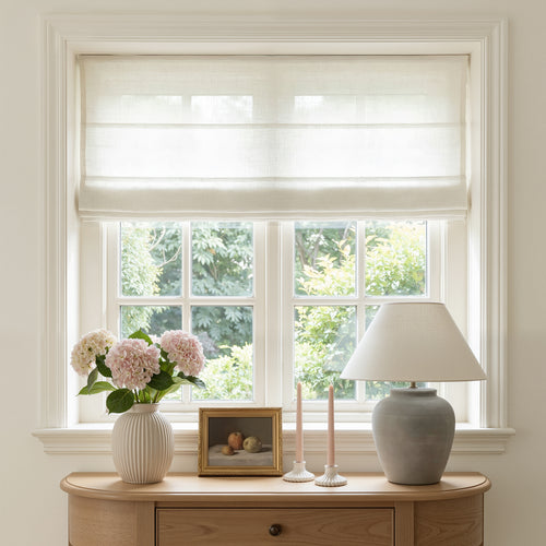 Custom light filtering linen Roman shade with slub texture