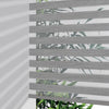 Joydeco Pro cordless zebra blinds in grey stripe pattern with leaf motif, partially lowered to show light filtering effect.