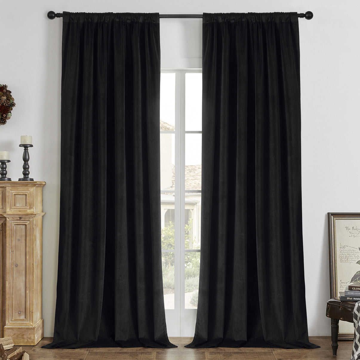 Two black velvet blackout curtains, 84-inch length, with rod pocket, enhance bedroom decor.