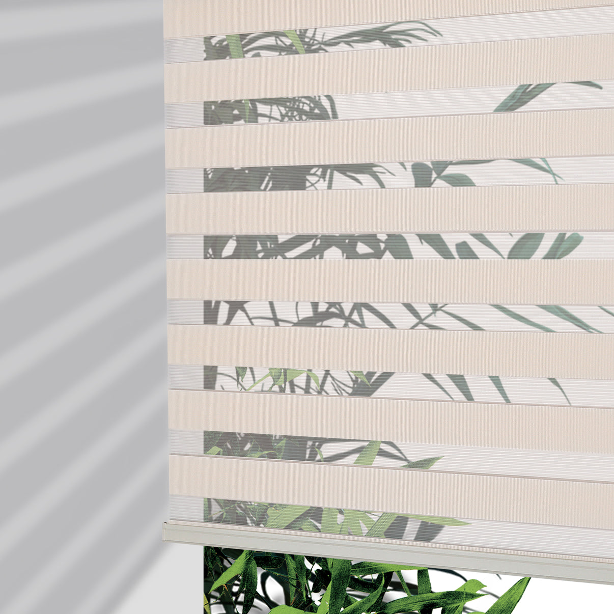 Joydeco Cordless Zebra Blinds, beige dual-layer fabric with green leaf pattern, partially lowered to show light filtering.