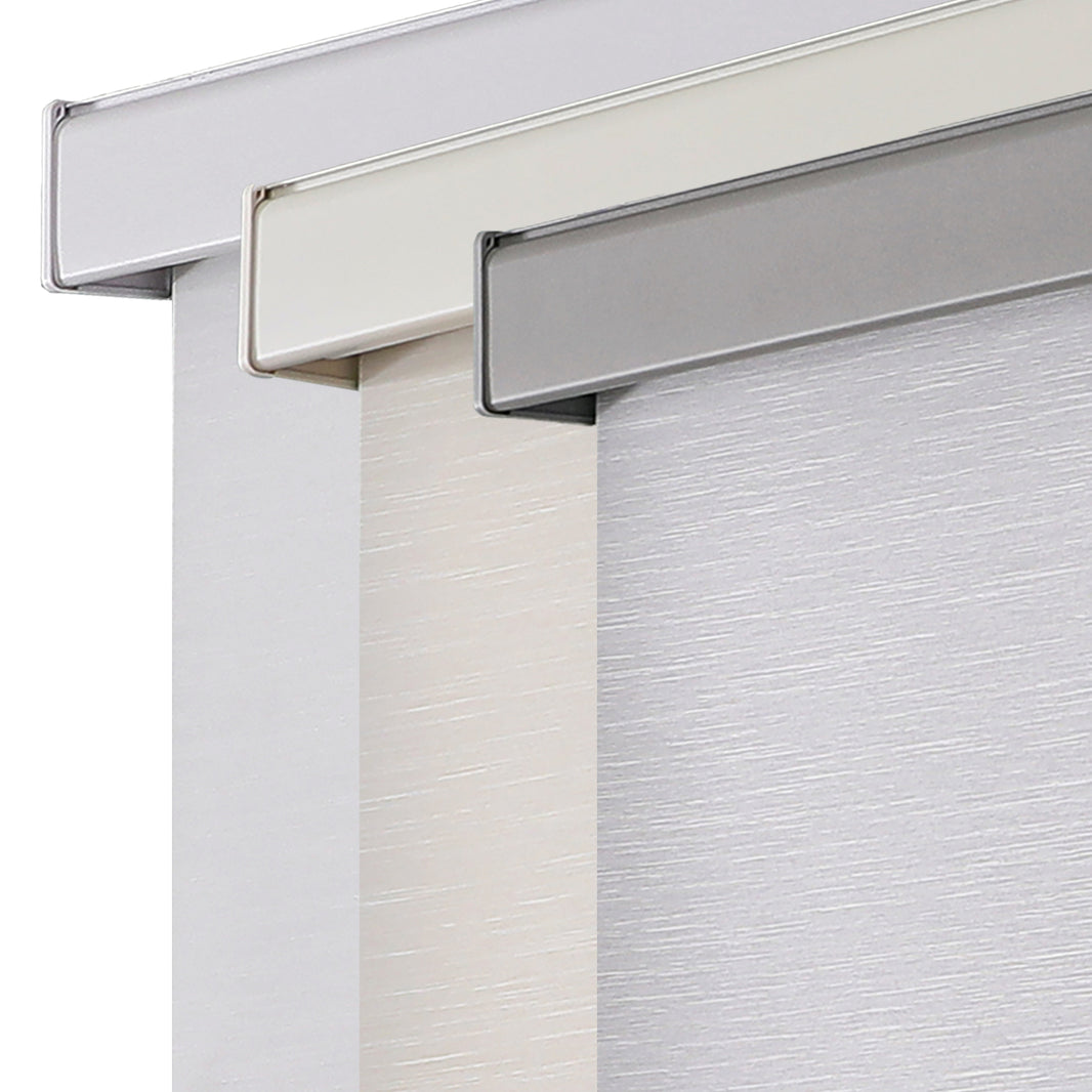 Three Free-Stop cordless blackout roller shades in white, cream, and gray with textured fabric and sleek aluminum valances.