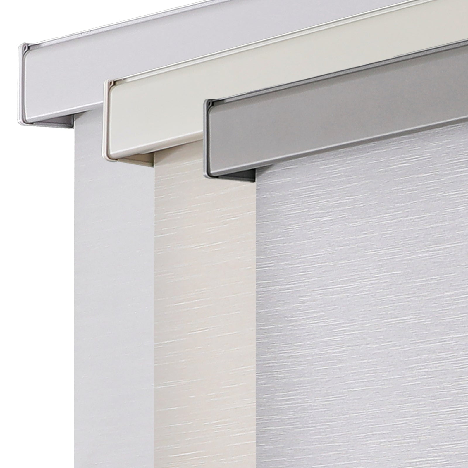 Three Free-Stop cordless blackout roller shades in white, cream, and gray with textured fabric and sleek aluminum valances.