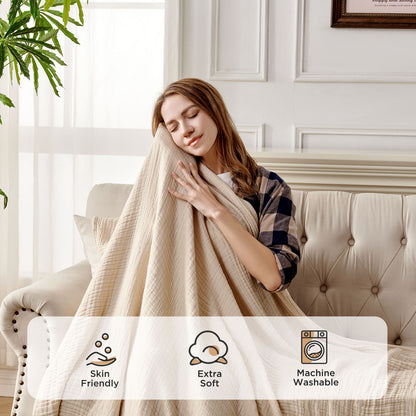 Woman embracing beige 4-layer cotton muslin throw blanket showing skin-friendly, extra soft, machine washable features.