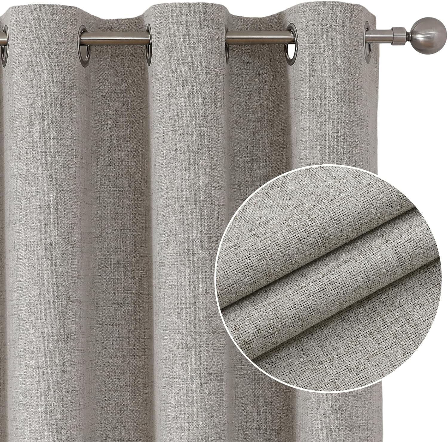 Close up of greyish white faux linen blackout curtains with textured weave and silver grommets hanging on a rod.