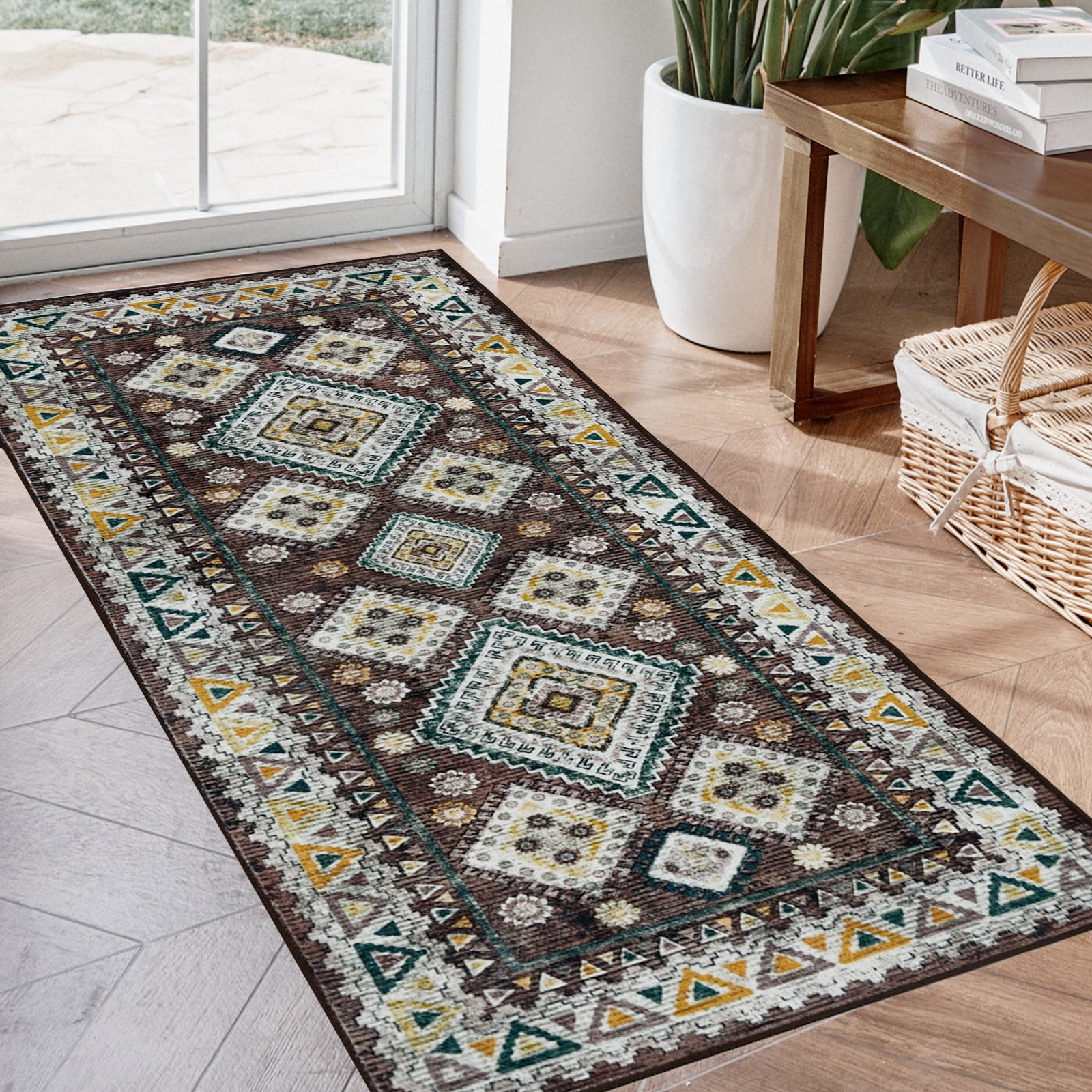 Joydeco vintage geometric runner rug, brown with yellow, white, teal diamond pattern, in entryway with wood floor.