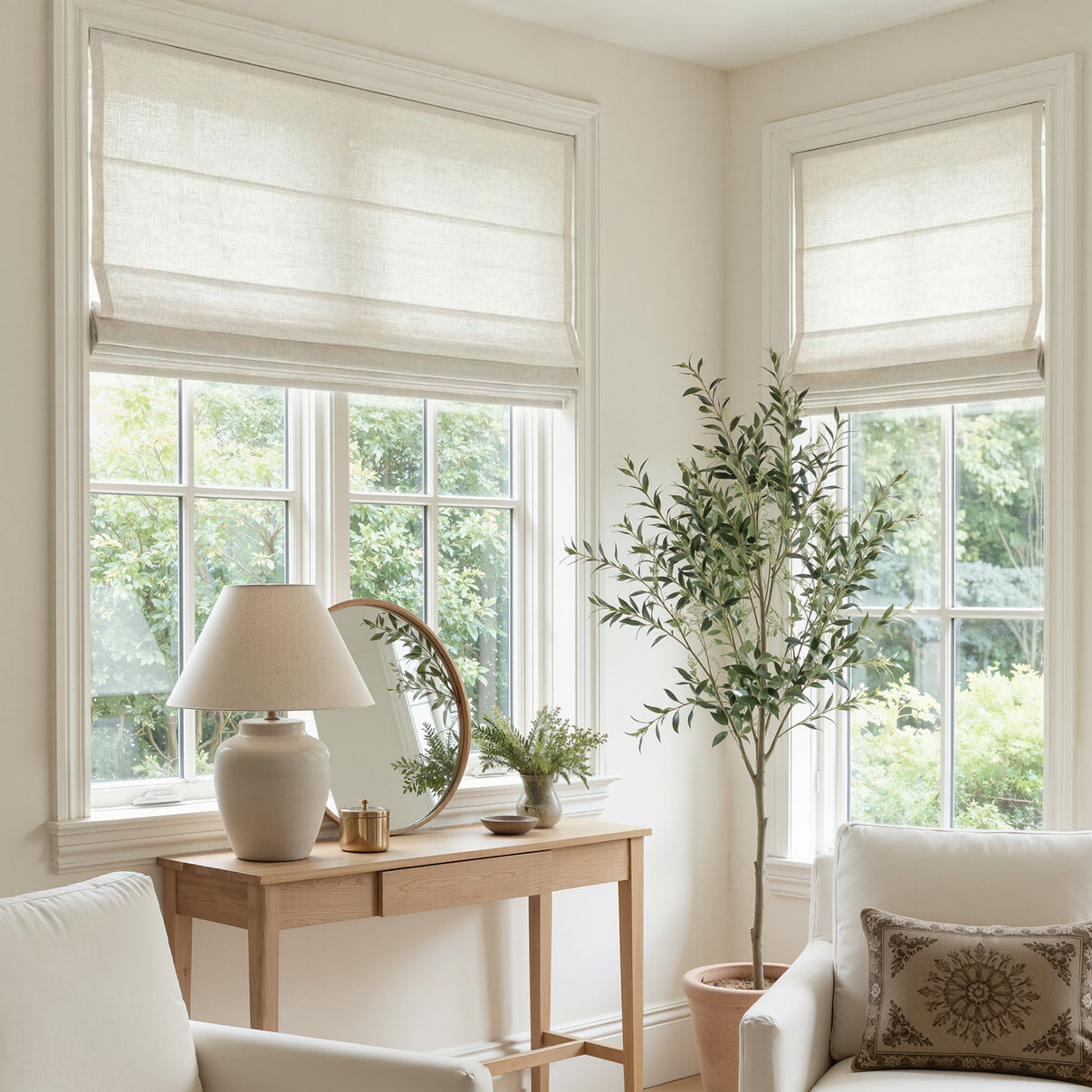 Custom Rowan light filtering Roman shade in natural slub linen blend.