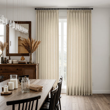 Beige textured linen blend curtains on black rod, soft light-filtering drapes in dining room