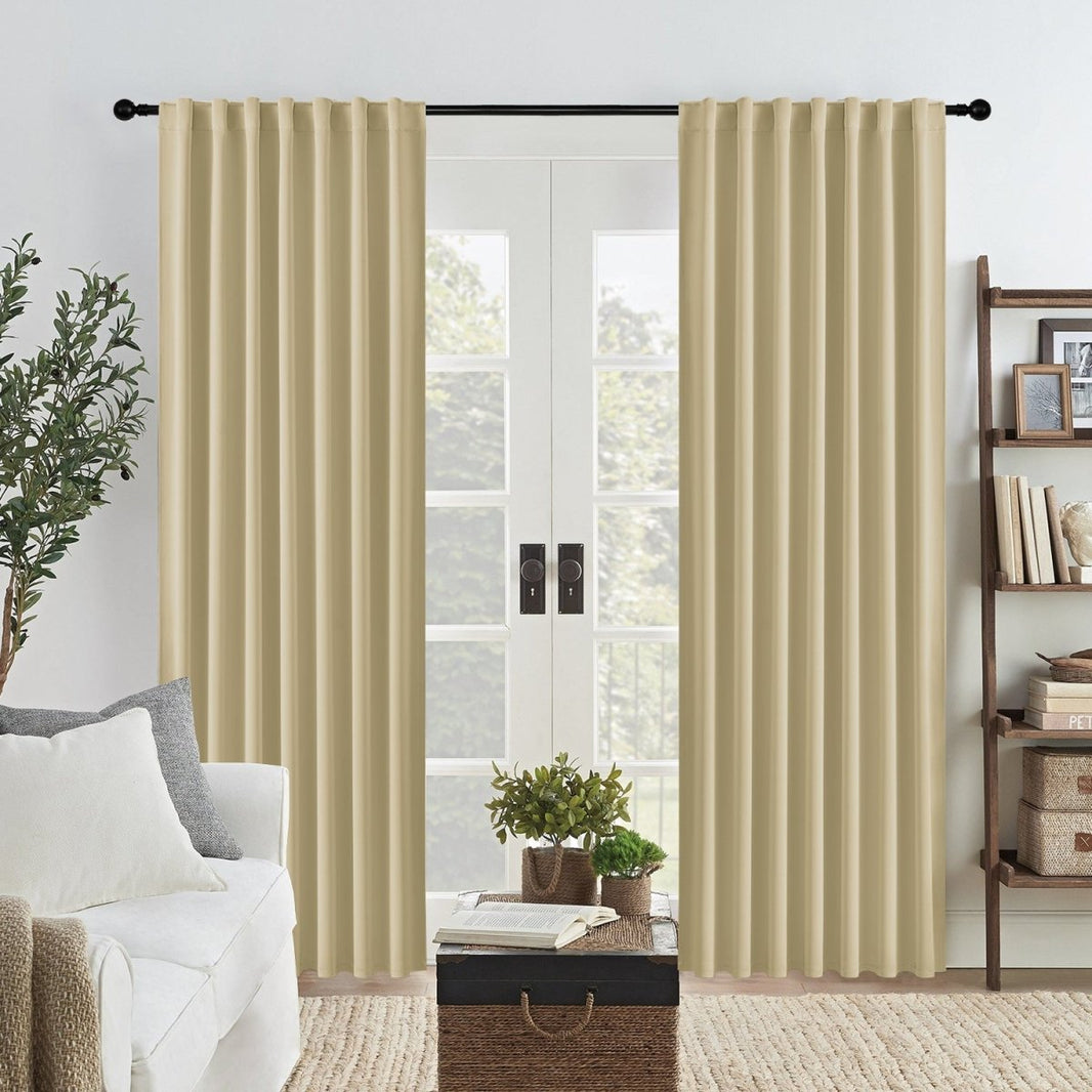 Joydeco black 96 inch blackout curtains, two panels, back tab design, on black rod over French doors.