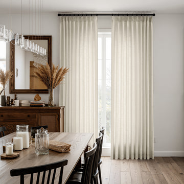 Textured linen blend curtains in natural beige, softly filtering light in a dining room