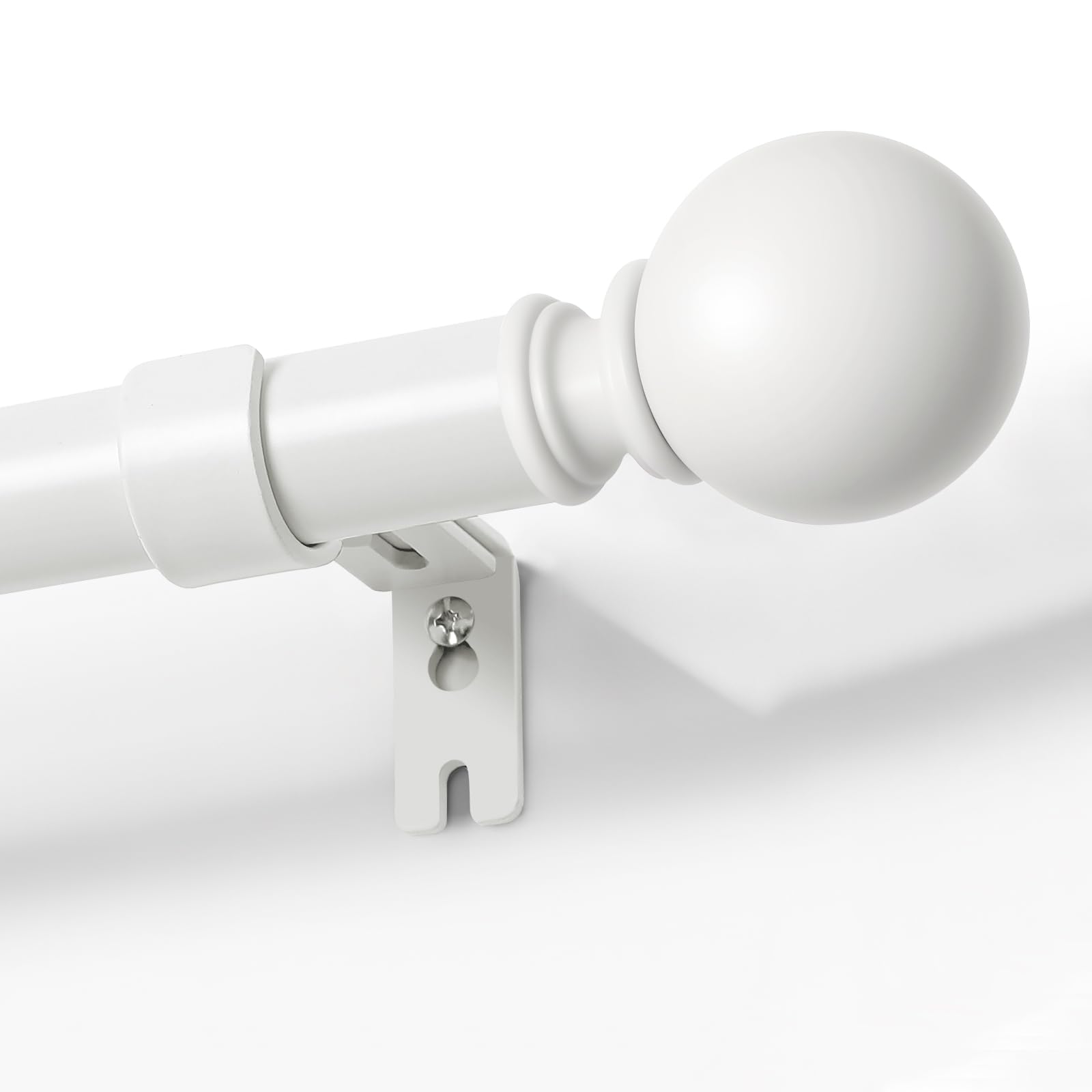Joydeco matte black adjustable curtain rod, 1-inch diameter, with spherical finial and bracket, mounted on white wall.