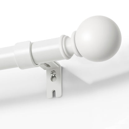 Joydeco matte black adjustable curtain rod, 1-inch diameter, with spherical finial and bracket, mounted on white wall.