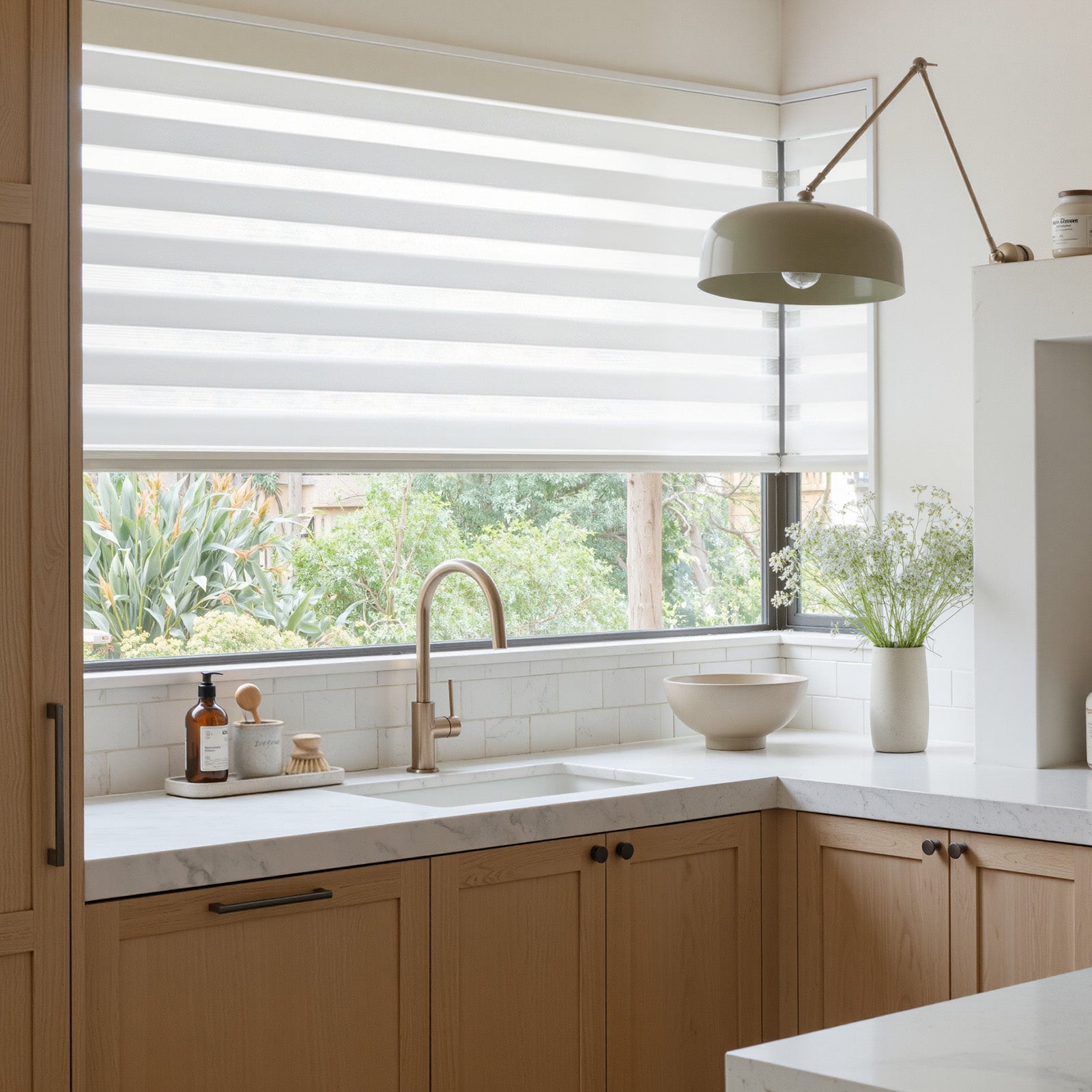 Marlow light filtering zebra shade with alternating sheer/solid bands for light control.