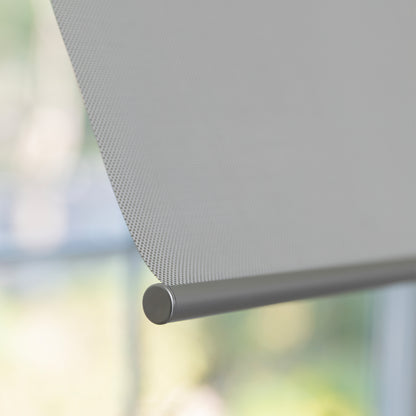 Joydeco Cove light filtering solar shade showing textured semi-sheer fabric and roller bar.
