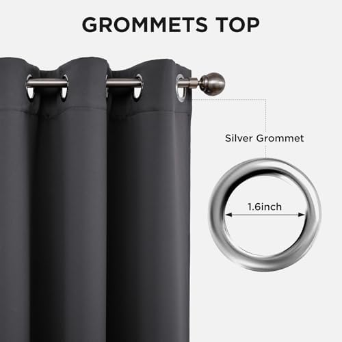 Close-up of dark grey blackout curtains showcasing silver grommets with 1.6-inch inner diameter for easy rod insertion.