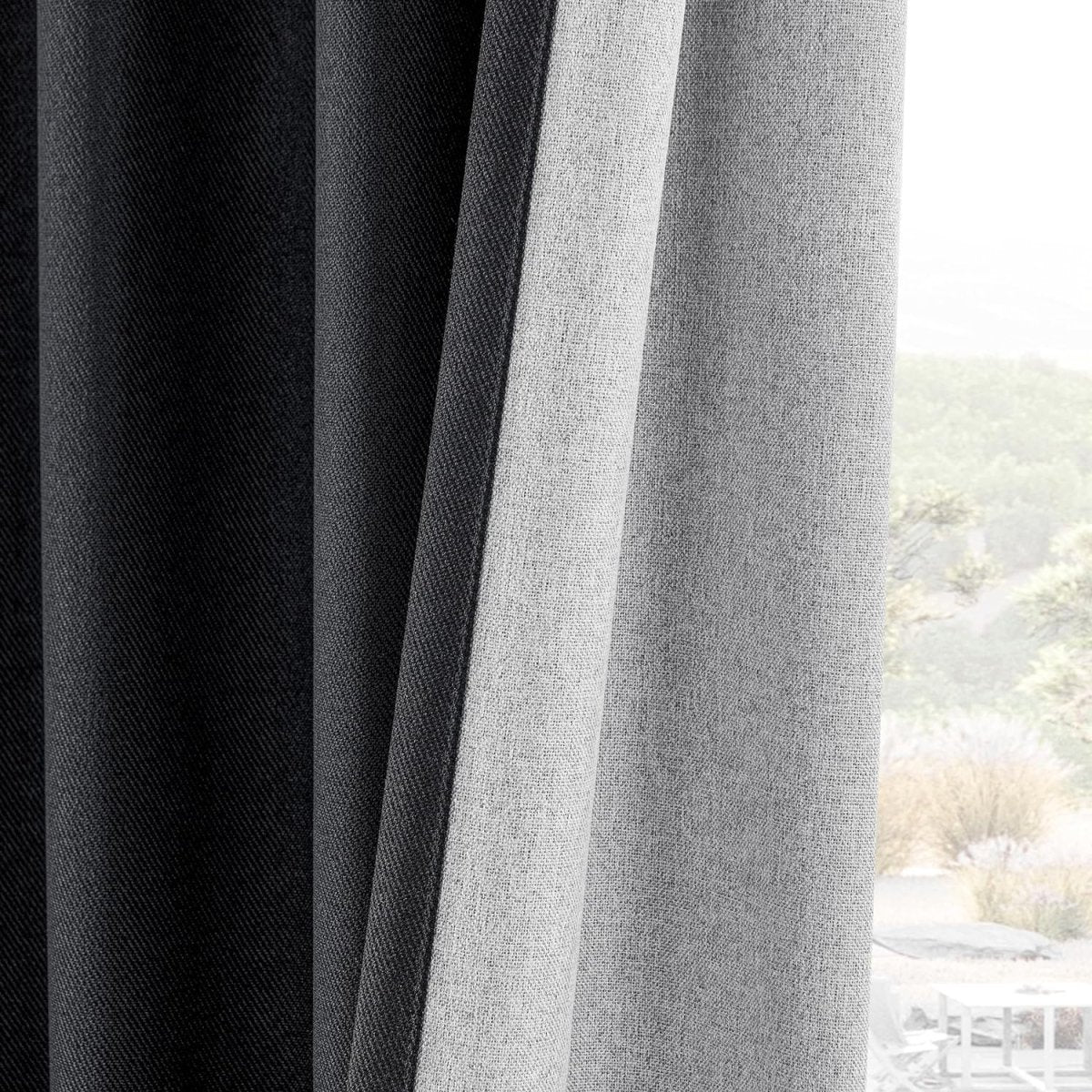 Close-up of Joydeco charcoal and light grey faux linen blackout curtains, showcasing texture.