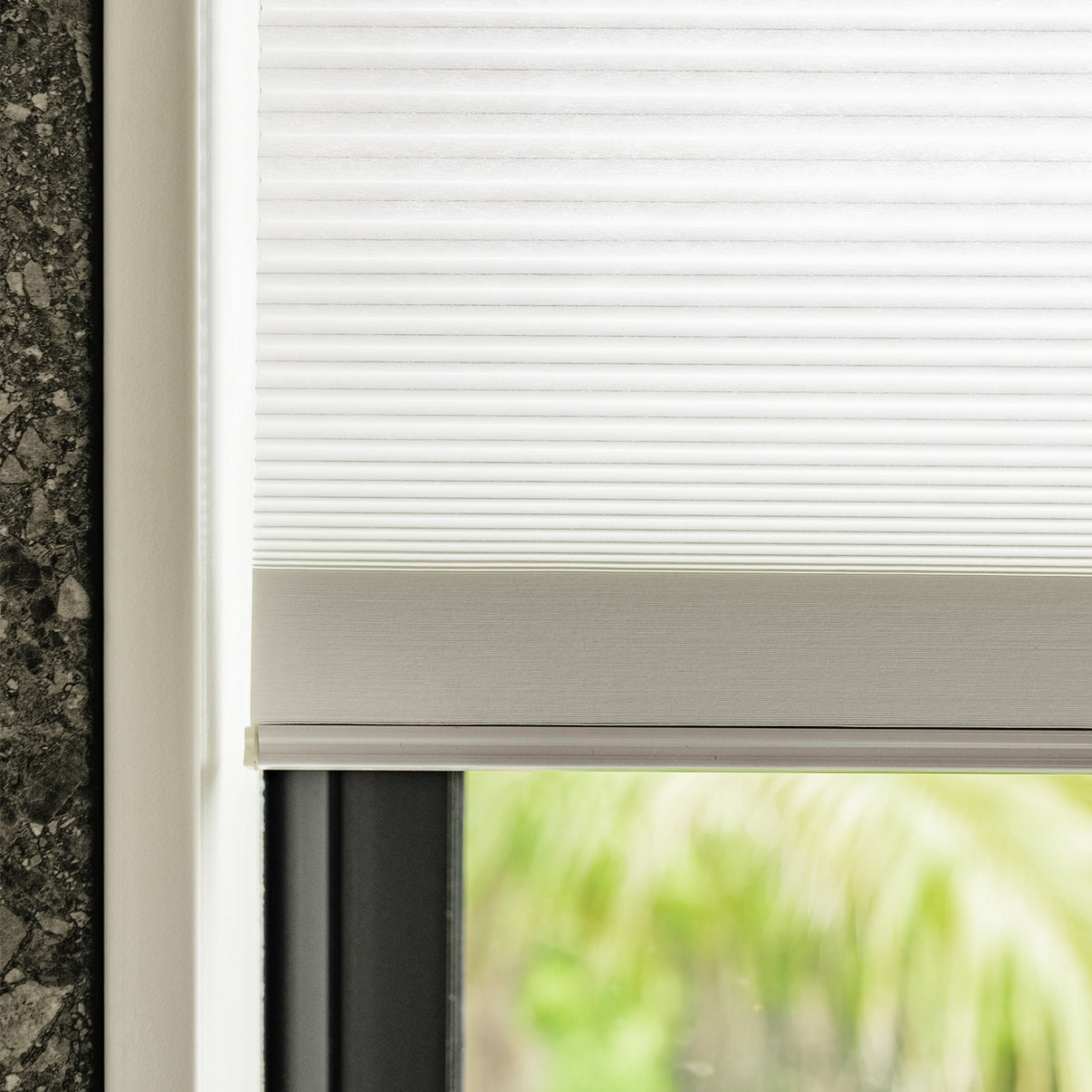 White Solace cellular shade, honeycomb texture, light filtering blinds and shades.