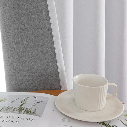 Joydeco light gray faux linen blackout curtain close-up, highlighting fabric texture and meticulous stitching.