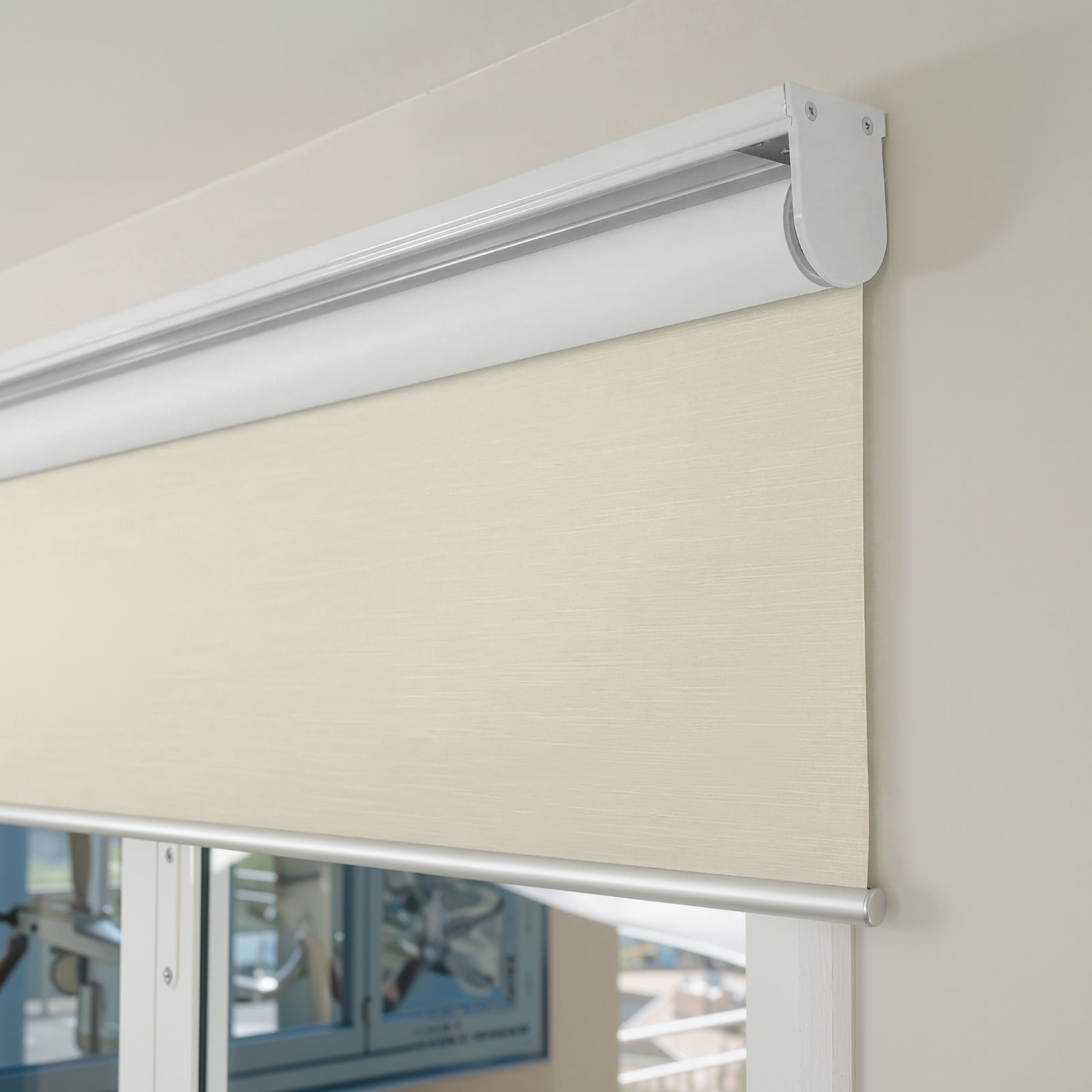 Cream Ashby blackout roller shade, plain weave fabric, 100% blackout.