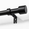 Joydeco modern black adjustable curtain rod, 1 inch diameter, with sleek finial and heavy-duty bracket shown mounted on wall.