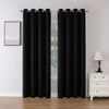 Joydeco Black Grommet Blackout Curtains, 84 inch length, two panels shown in a bedroom window context.