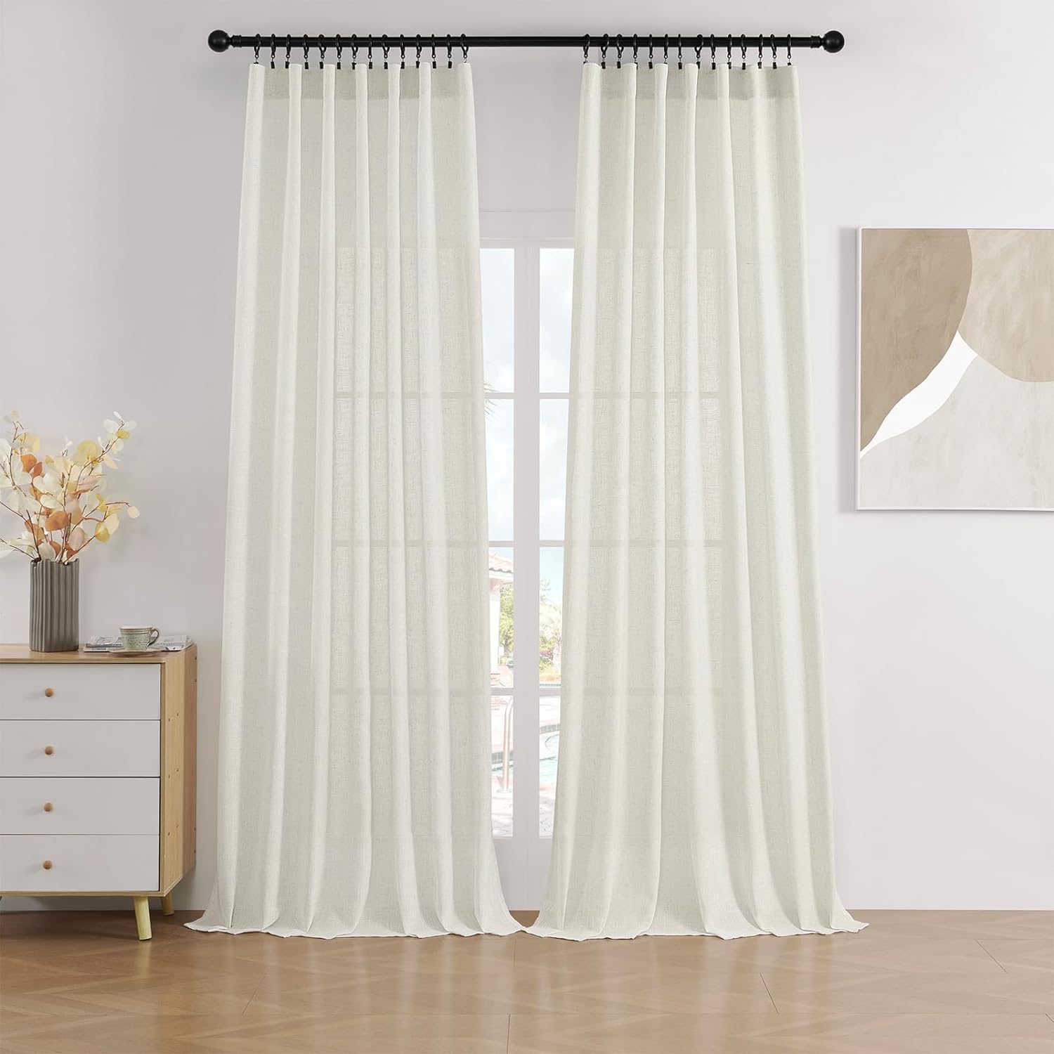 Joydeco off-white semi-sheer linen blend curtains in living room, filtering natural light.