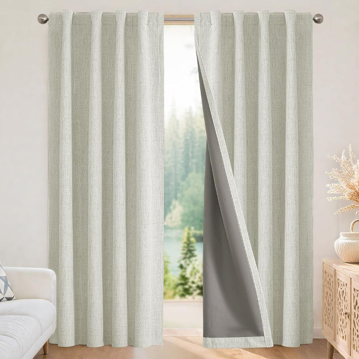 Joydeco light beige linen textured blackout curtains with dark gray lining shown in a modern living room.