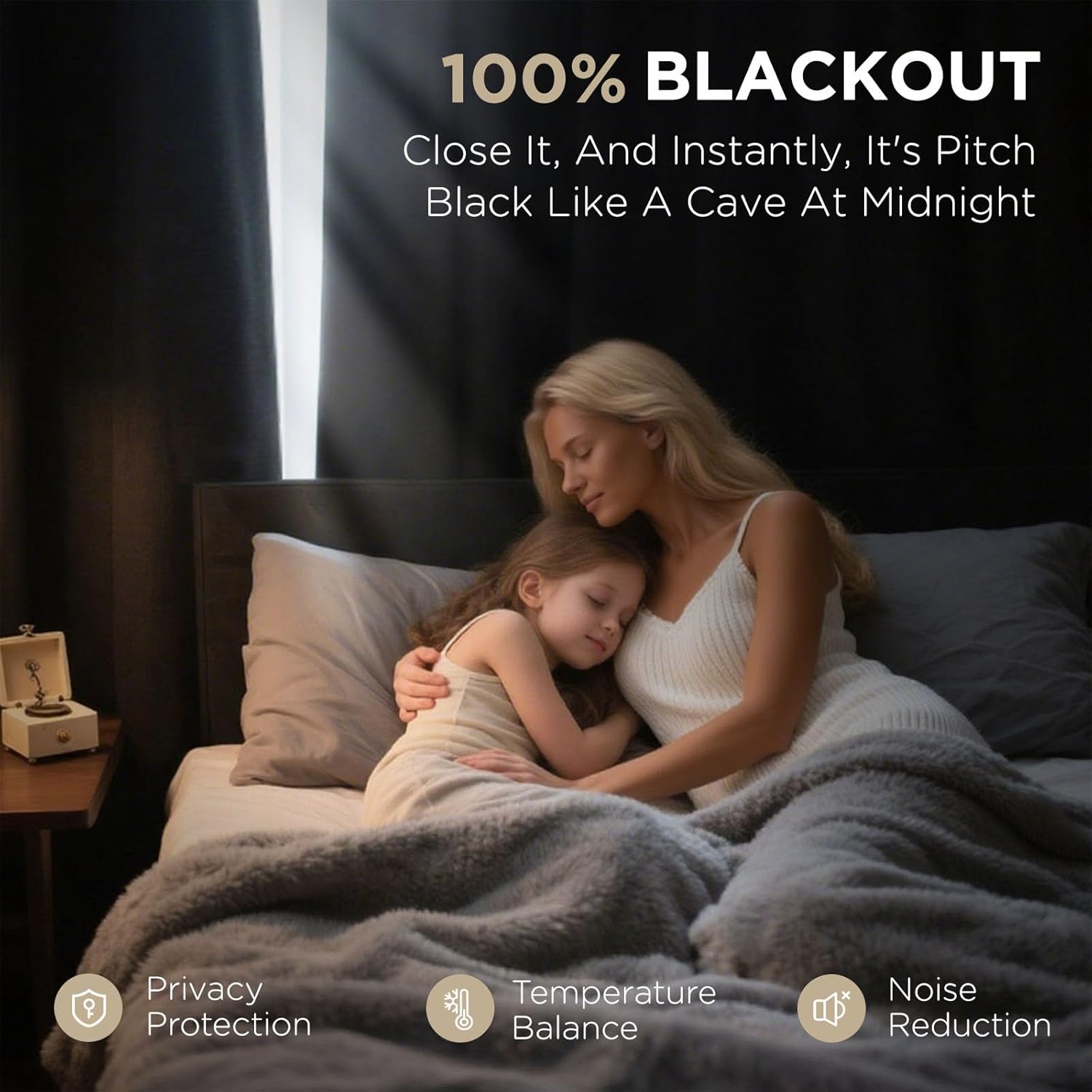 Woman and child sleep peacefully thanks to Joydeco 100% blackout curtains. Features privacy, temp balance, noise reduction.