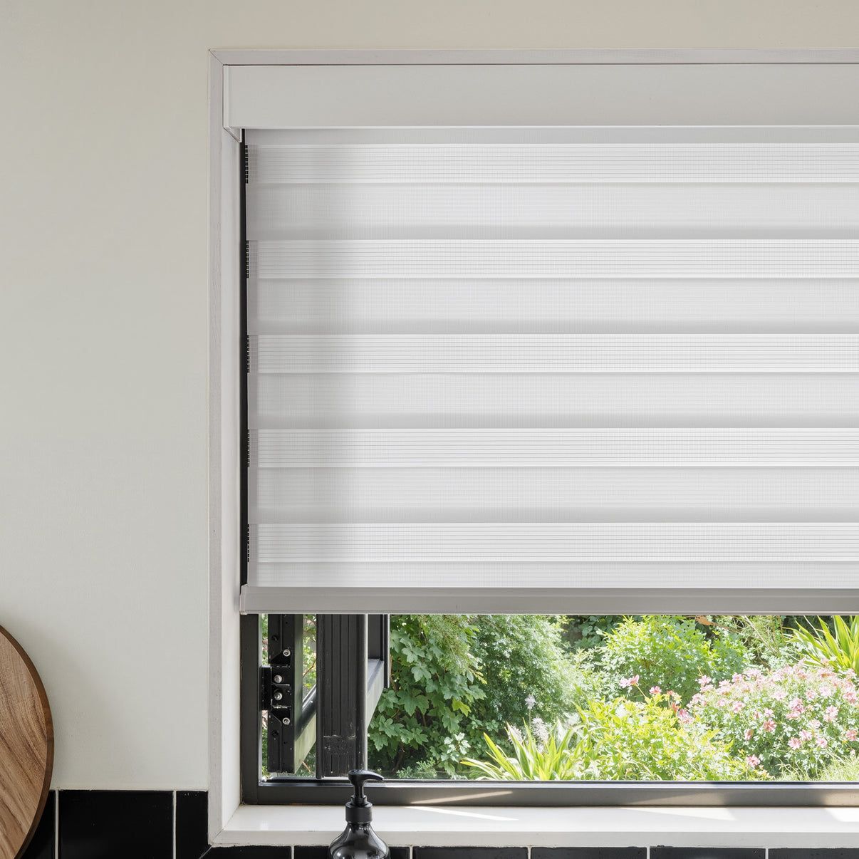 Marlow Light Filtering Zebra Shade, a modern window treatment with alternating sheer and solid bands.