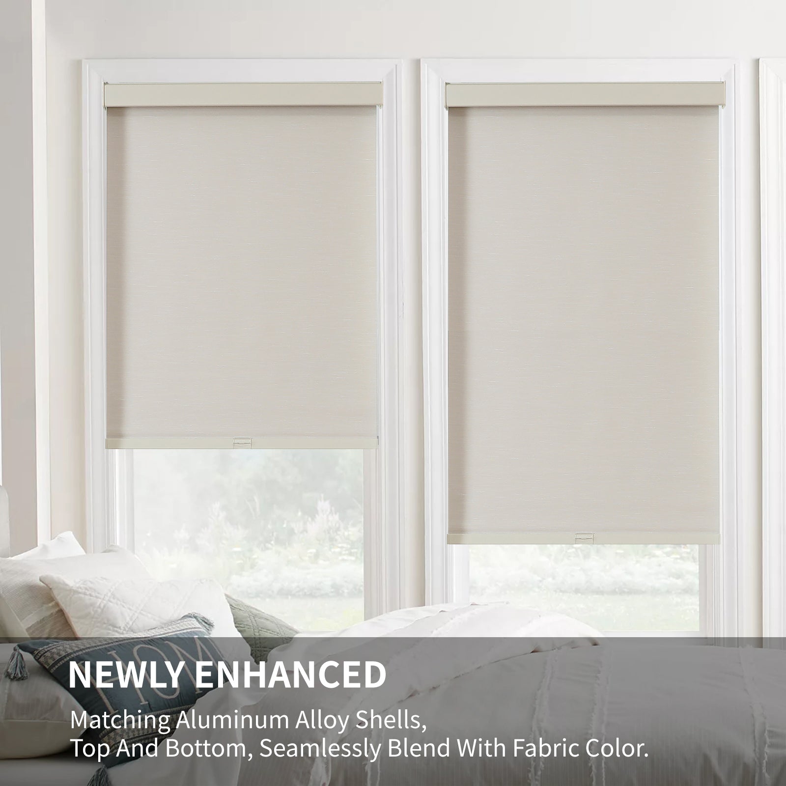 Beige cordless blackout roller shades with woven texture and matching aluminum valances installed in white windows.
