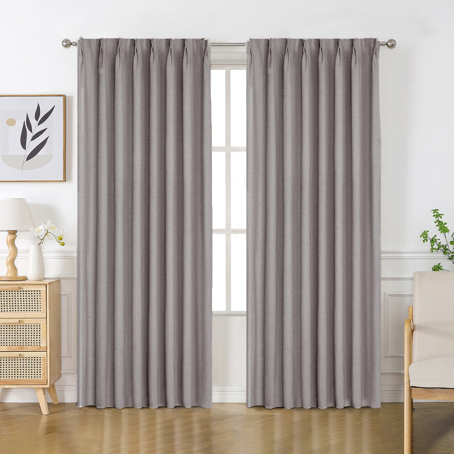 Medium gray Flaxaline linen blackout curtains with pinch pleats, enhancing room ambiance and privacy.