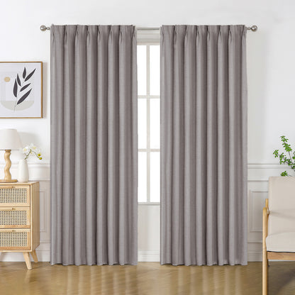 Medium gray Flaxaline linen blackout curtains with pinch pleats, enhancing room ambiance and privacy.