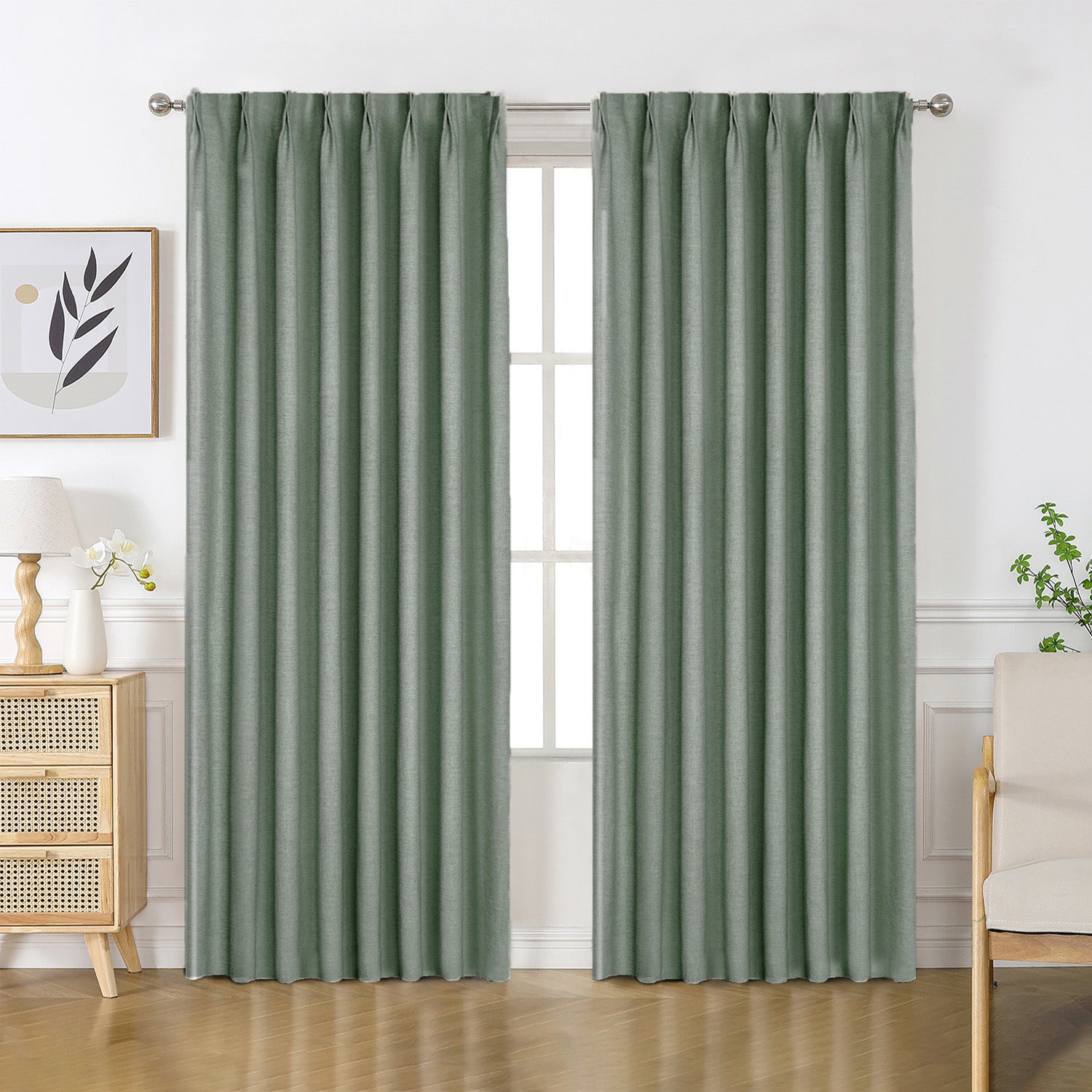 Sage green Flaxaline linen blackout curtains with a natural, visible weave texture, styled in a modern bedroom.