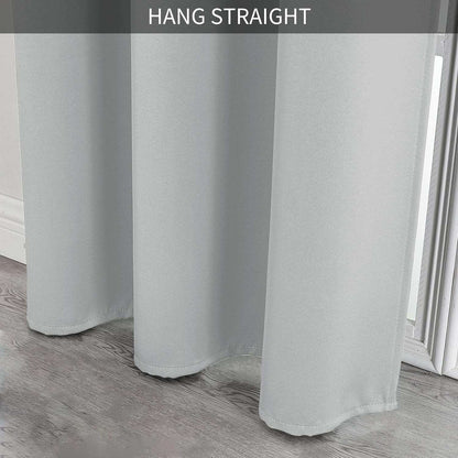 Light grey blackout curtain fabric close-up showcasing smooth texture and straight drape.