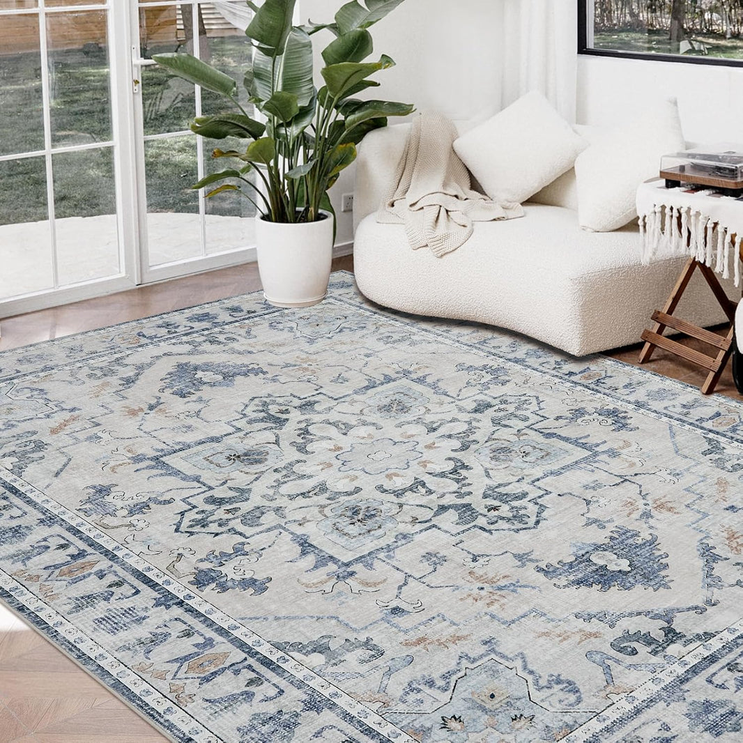 Joydeco 8x10 blue and grey vintage floral area rug in a modern living room setting, low pile chenille machine washable.