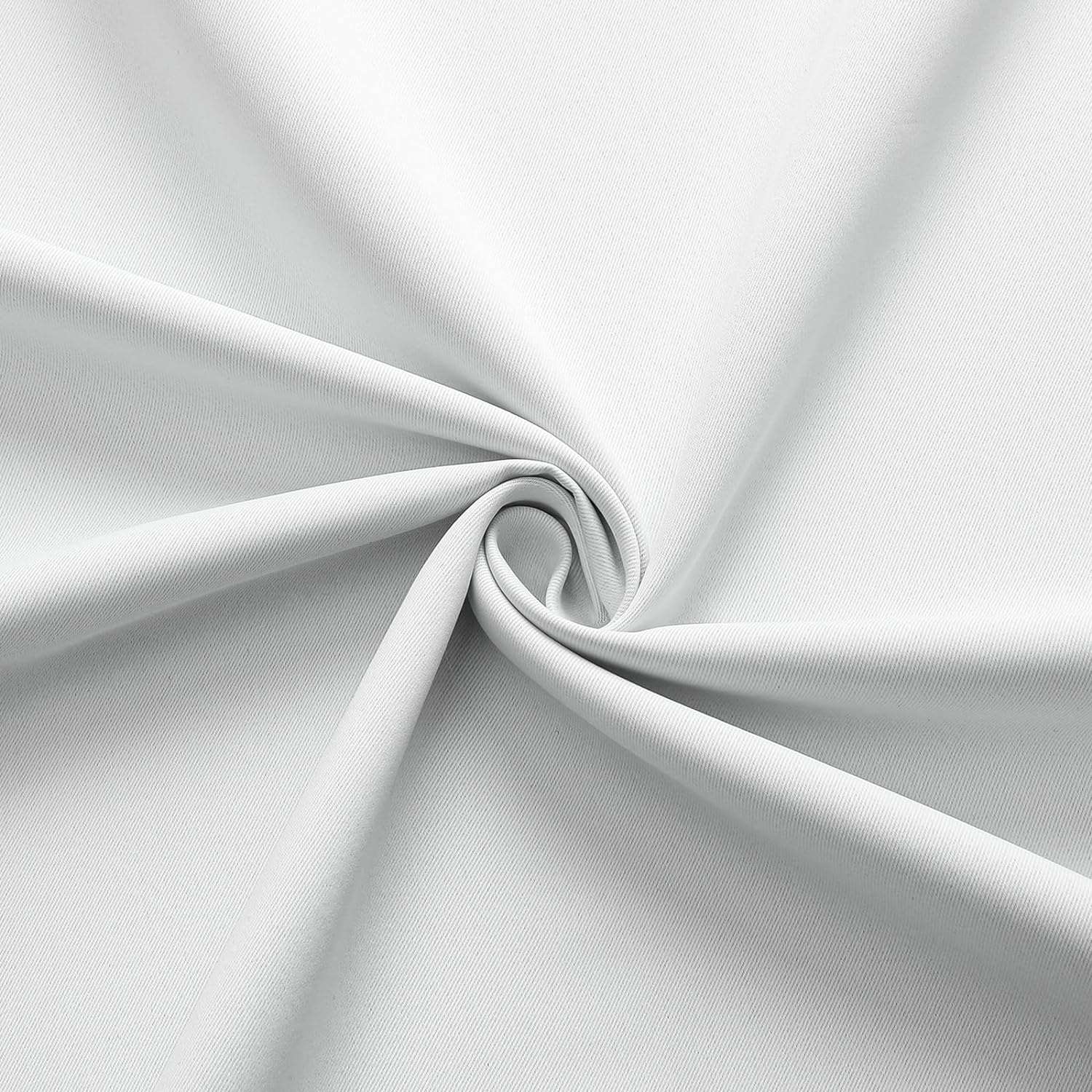 Close-up texture of white Joydeco blackout curtain fabric, 100% polyester, thermal insulated, wrinkle-free.