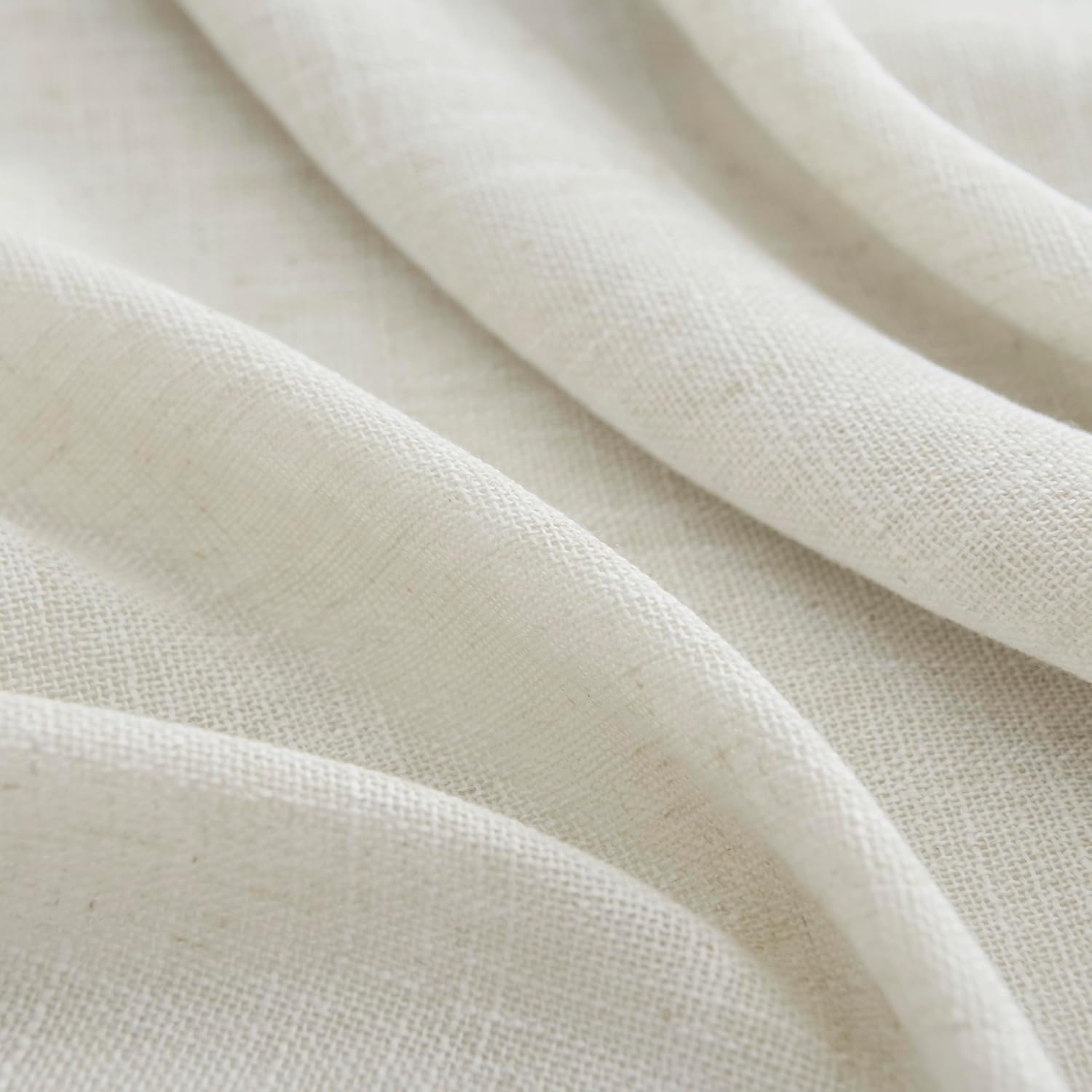 Joydeco natural linen curtain fabric texture. Close-up shows soft folds, light filtering quality for bedroom/living room.
