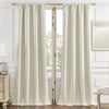 Cream velvet blackout curtains with thermal insulation hanging from gold rods, framing French doors to a garden.