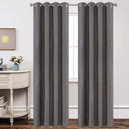 Two grey linen blend blackout curtains with textured weave and silver grommets hanging over a window on a product page.