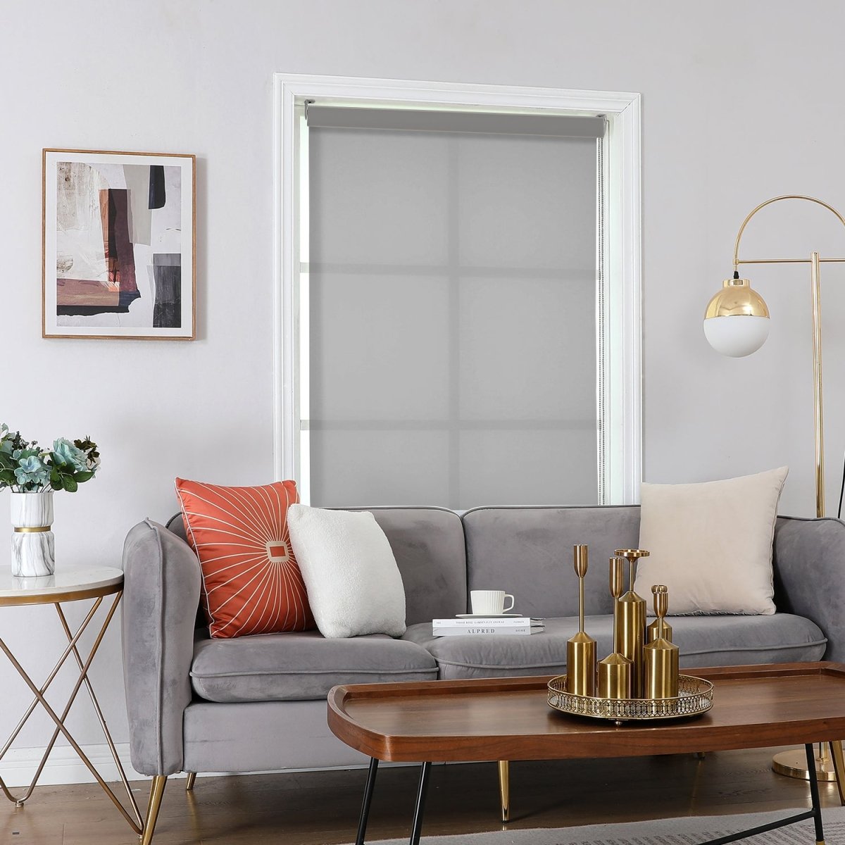 Joydeco light grey custom motorization sheer weave solar roller shade, partially lowered in a living room.