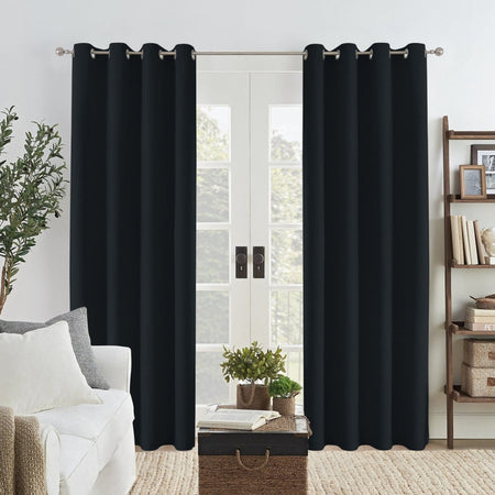 Black Joydeco custom linen blackout curtains with grommets hanging on a double door.