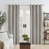 Joydeco Grey Linen Blackout Curtains with grommets framing a glass door in a modern living room.