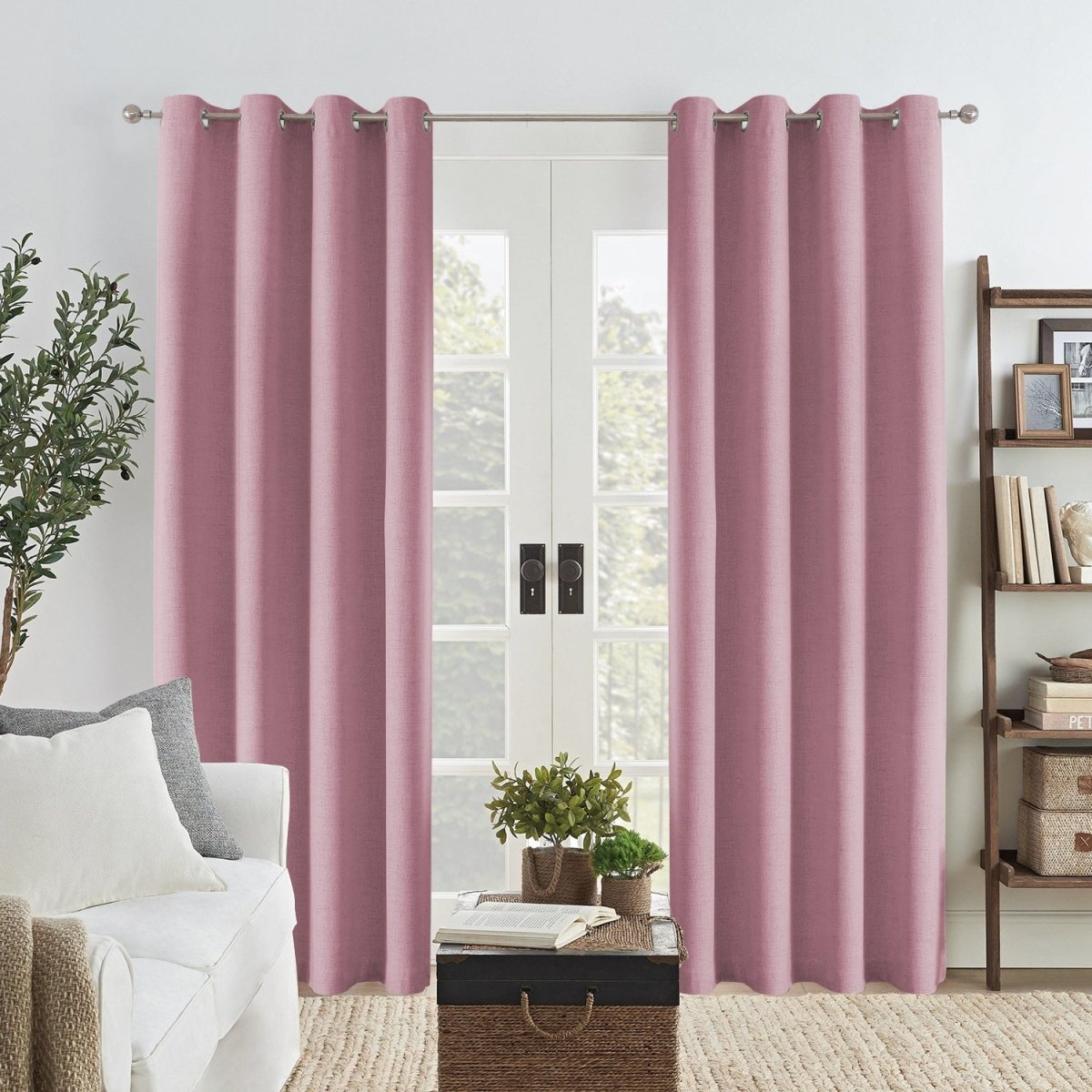 Light pink Joydeco custom linen blackout curtains with grommets on a silver rod, French door.