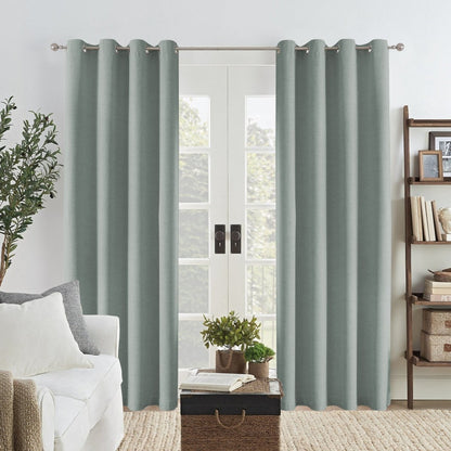 Sage green Joydeco linen blackout curtains with textured weave, framing double doors in a modern living room.