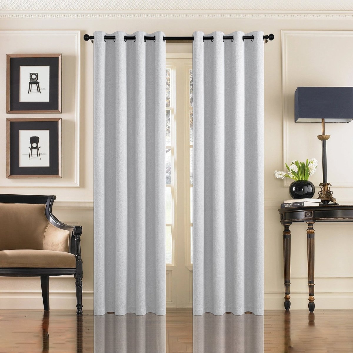 Light gray faux linen blackout curtains with grommets in a living room setting.