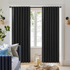 Joydeco black faux linen 100% blackout thermal insulated curtains hung on a window, showcasing room darkening and style.