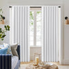Joydeco white 100% blackout curtains with brushed texture and vertical pleats, shown on a black rod in a living room.